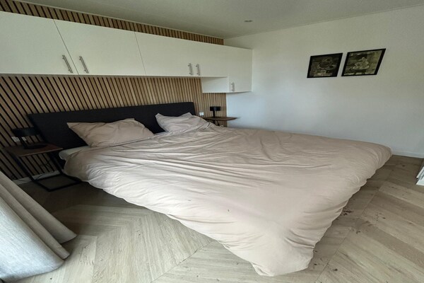 Foto van Ontsnapping in het bos Palette Resort de Steppe - Vakantiehuis in Ulicoten - BedRoom