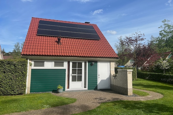 Foto van Vakantiehuis in Hellendoorn bij bos - Vakantiehuis in Hellendoorn - ExteriorSummer