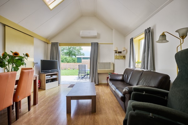 Foto van Gezellig Vakantiehuis in een heerlijke omgeving. - Vakantiehuis in De Kiel - LivingRoom