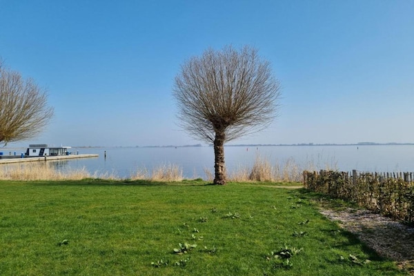 Foto van Woonboot in Offingawier met Uitzicht op Zee - Vakantiehuis in Offingawier - AreaSummer5KM