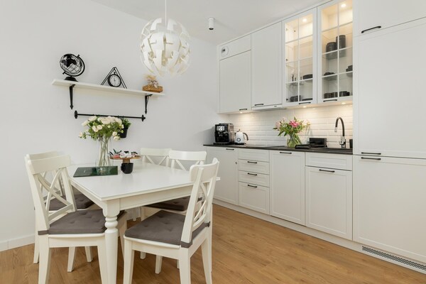 Foto van Appartement vlakbij zee, met zwembad en sauna. - Vakantiehuis in Pobierowo - DiningRoom