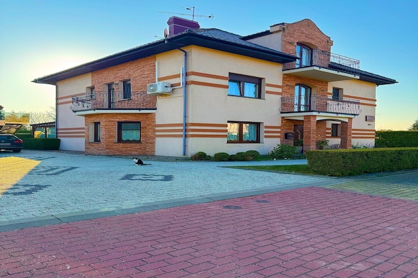 Foto van Appartement in Międzywodzie bij strand - Vakantiehuis in Międzywodzie - ExteriorSummer