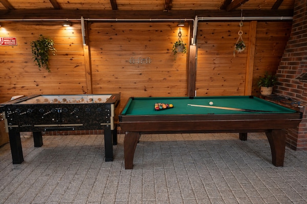 Foto van Appartement met zwembad en jacuzzi, Międzywodzie - Vakantiehuis in Międzywodzie - RecreationRoom