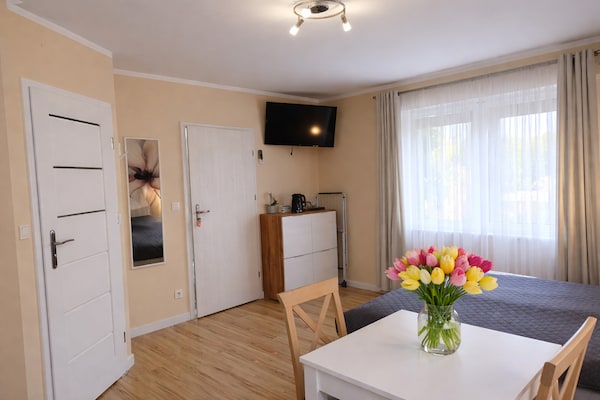 Foto van Appartement met zwembad en jacuzzi, Międzywodzie - Vakantiehuis in Międzywodzie - LivingRoom