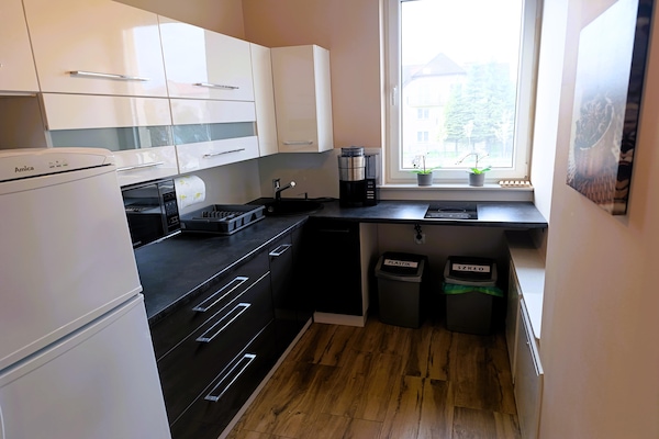 Foto van Appartement met zwembad en jacuzzi, Międzywodzie - Vakantiehuis in Międzywodzie - Kitchen
