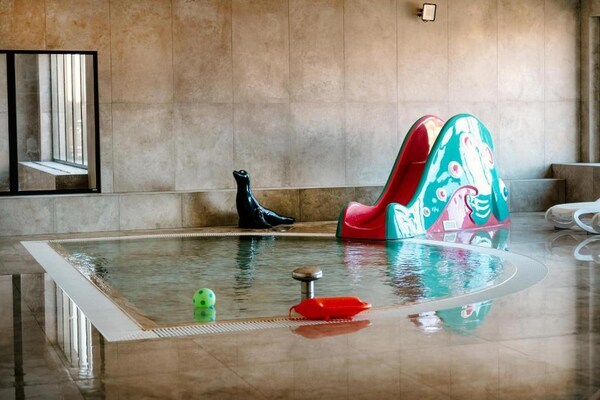 Foto van Appartement met uitzicht op de rivier, zwembad. - Vakantiehuis in Dziwnow - LivingRoom