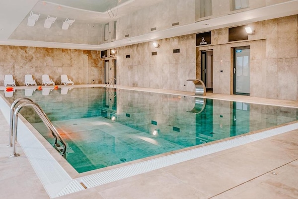 Foto van Appartement met uitzicht op de rivier, zwembad - Vakantiehuis in Dziwnow - Pool
