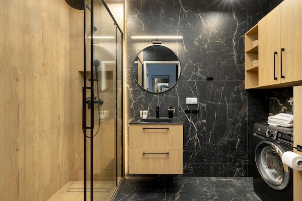 Foto van Appartement met uitzicht op de rivier, zwembad - Vakantiehuis in Dziwnow - BathRoom
