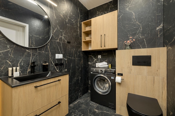 Foto van Appartement met uitzicht op de rivier, zwembad - Vakantiehuis in Dziwnow - BathRoom