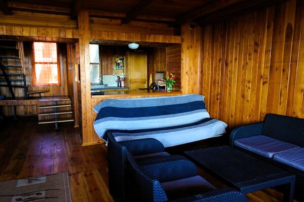 Foto van Houten Chalet bij Jamno-meer en Zee - Vakantiehuis in Łazy - LivingRoom