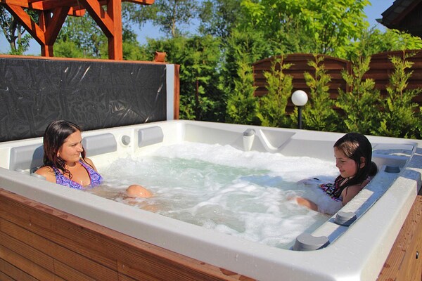 Foto van Comfortabele vakantiehuizen, bad, jacuzzi, sauna - Vakantiehuis in Osieki - terrace