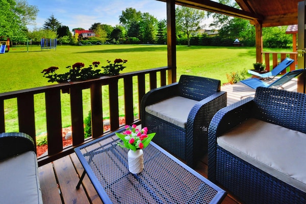 Foto van Huisje bij Aquapark Helios - Vakantiehuis in Ustronie Morskie - TerraceBalcony