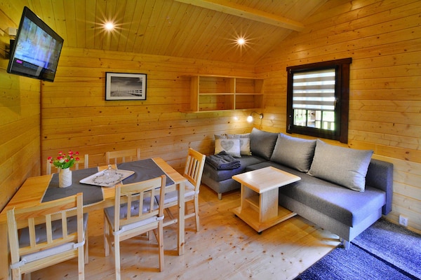 Foto van Huisje bij Aquapark Helios - Vakantiehuis in Ustronie Morskie - LivingRoom