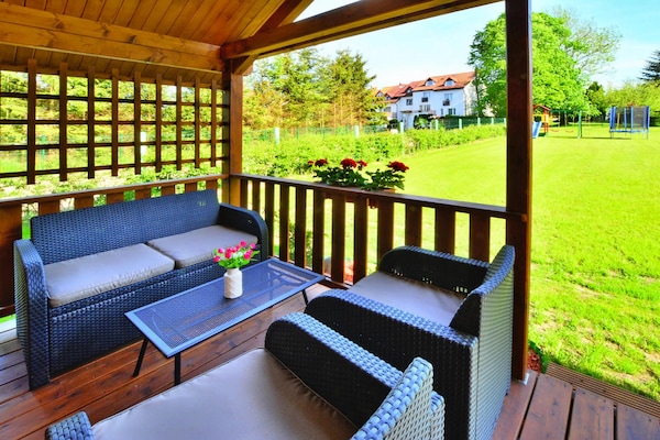 Foto van Huisje bij Aquapark Helios - Vakantiehuis in Ustronie Morskie - TerraceBalcony