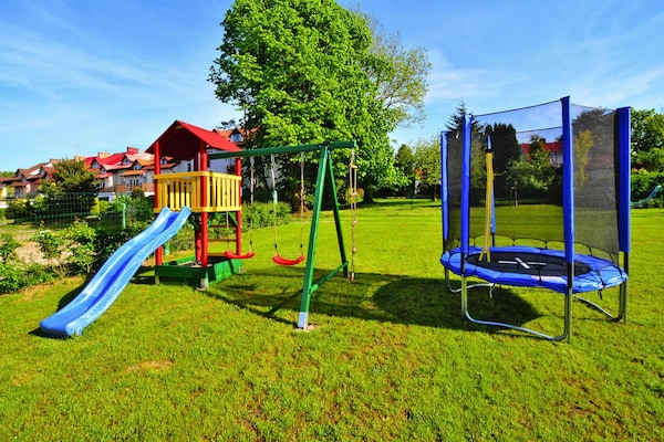 Foto van Huisje bij Aquapark Helios - Vakantiehuis in Ustronie Morskie - GardenSummer