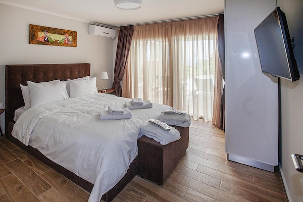 Foto van Villa aan zee met privézwembad - Vakantiehuis in Chanioti - BedRoom