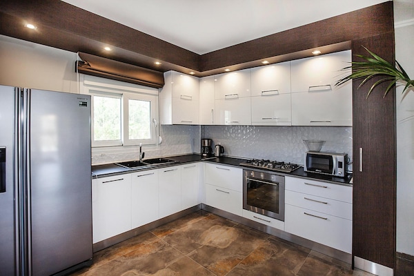 Foto van Villa aan zee met privézwembad - Vakantiehuis in Chanioti - Kitchen